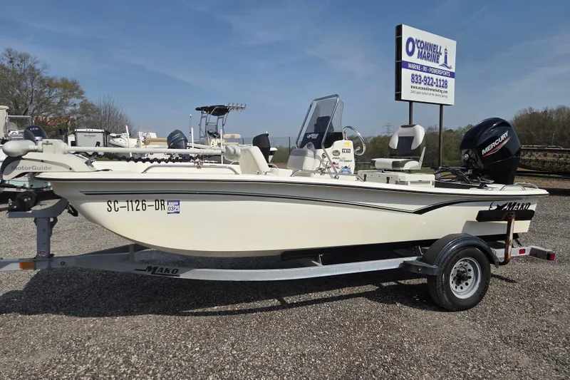 The Image of 2021 Mako Pro Skiff 15 CC boat on trailer at O'Connell Marine dealership. - 0