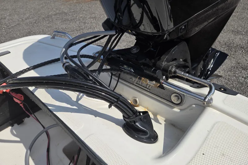 Slide: The Image of 2021 Mako Pro Skiff 15 CC boat engine and wiring detail. - 12