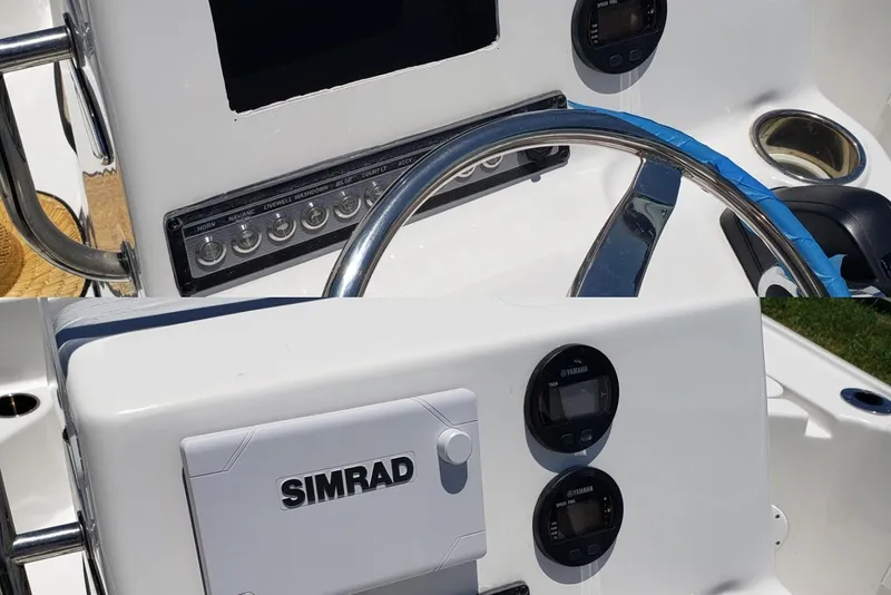 Slide: The Image of 2020 Tidewater 1910 Bay Max boat dashboard with Simrad electronics and Yamaha gauges. - 15