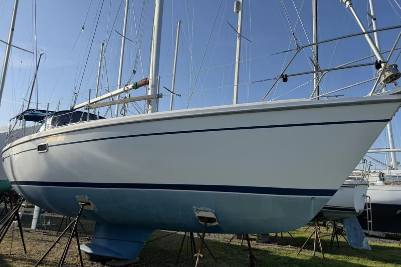 Slide: The Image of 1995 Catalina 36 MkII sailboat on stands, ready for maintenance. - 2