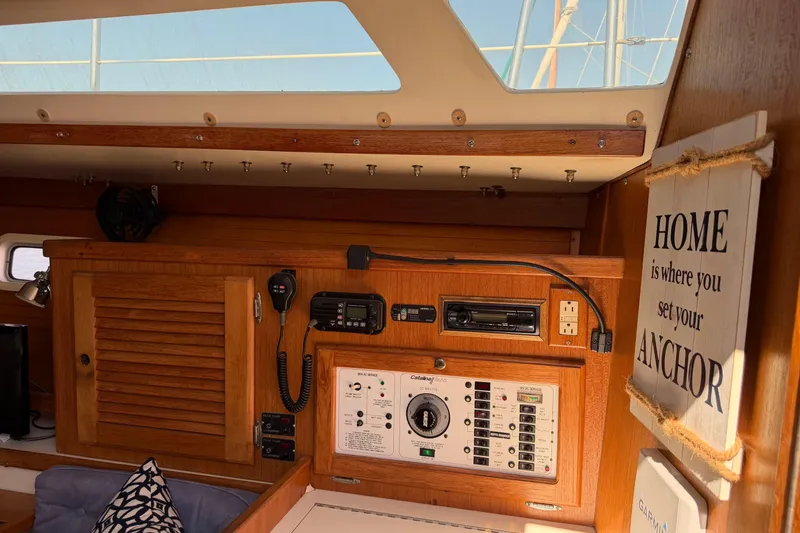 Slide: The Image of Interior of a 1995 Catalina 36 MkII sailboat with navigation equipment and decor. - 23