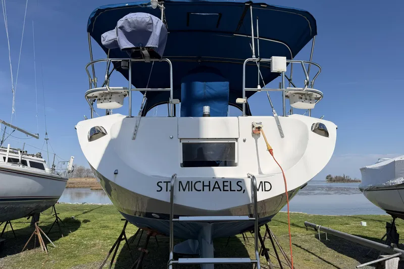Slide: The Image of Catalina 36 MkII sailboat from 1995 on land, St. Michaels, MD, with blue canopy. - 5