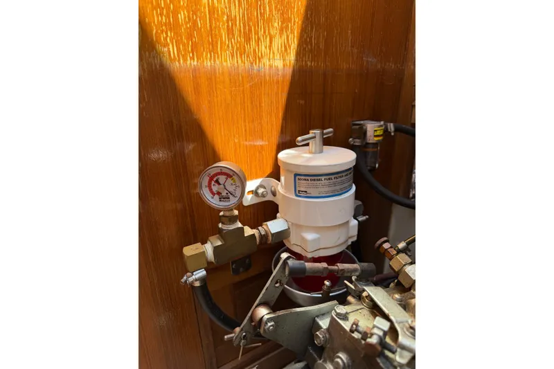 Slide: The Image of Diesel fuel filter system in a 1995 Catalina 36 MkII sailboat engine compartment. - 33