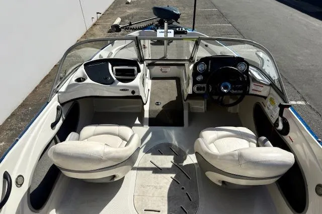 Slide: The Image of 2016 Nitro Z-7 Sport boat interior with dual seats and steering console. - 19