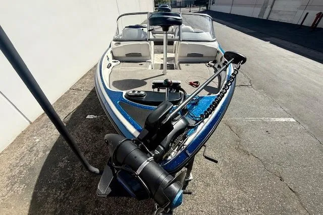 Slide: The Image of 2016 Nitro Z-7 Sport boat parked outdoors, featuring a sleek design and modern equipment. - 8