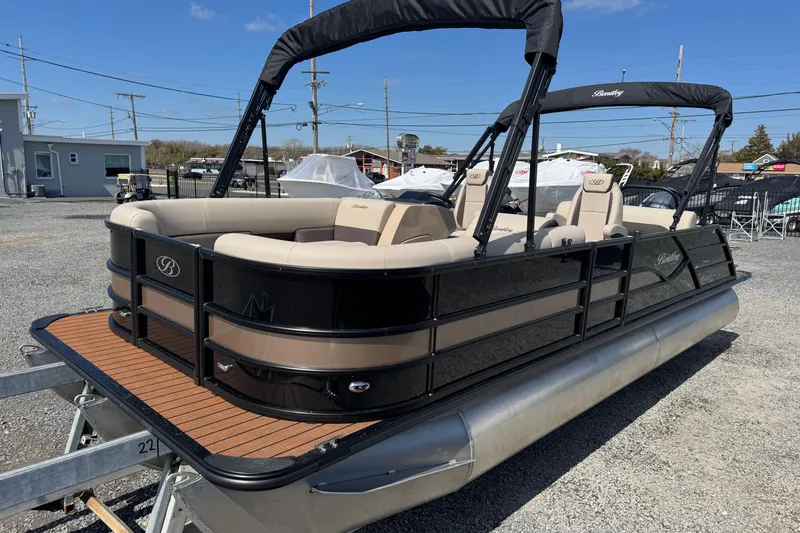 The Image of 2026 Bentley Pontoons Legacy 243 Swingback, sleek design, beige and black color scheme, on trailer. - 5