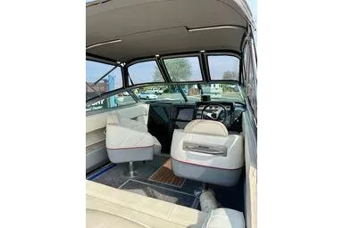 Slide: The Image of 1989 Cobalt Condurre 243 boat interior with seating and steering wheel. - 5
