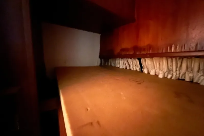 Slide: The Image of Interior view of 1989 Egg Harbor 35 Sport Fisherman boat storage area. - 21