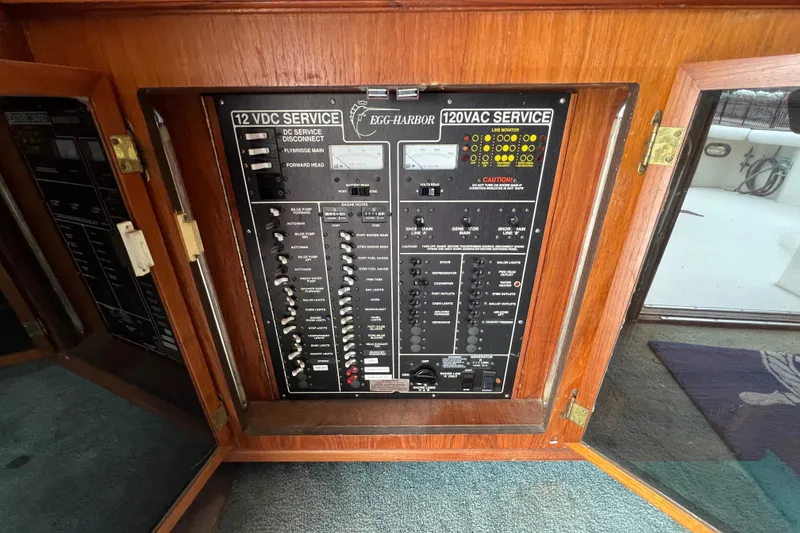 Slide: The Image of Electrical panel of a 1989 Egg Harbor 35 Sport Fisherman boat. - 24