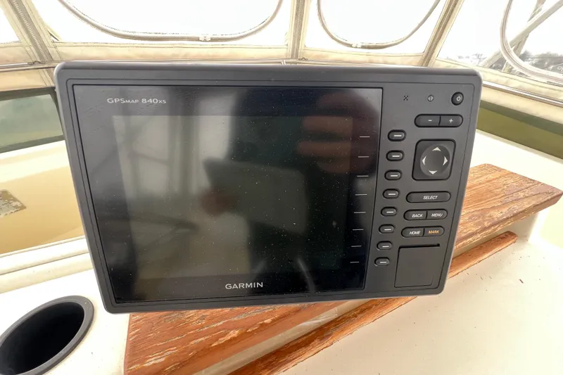 Slide: The Image of Garmin GPSMAP 840xs on 1989 Egg Harbor 35 Sport Fisherman boat dashboard. - 28