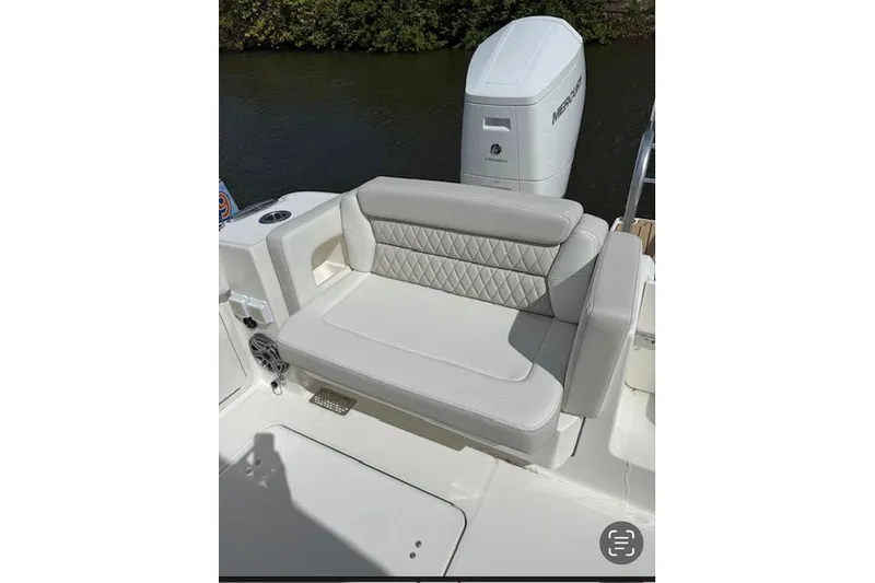 Slide: The Image of Luxurious seating on 2026 World Cat 400 DC-X Island boat, featuring diamond-stitched upholstery. - 20