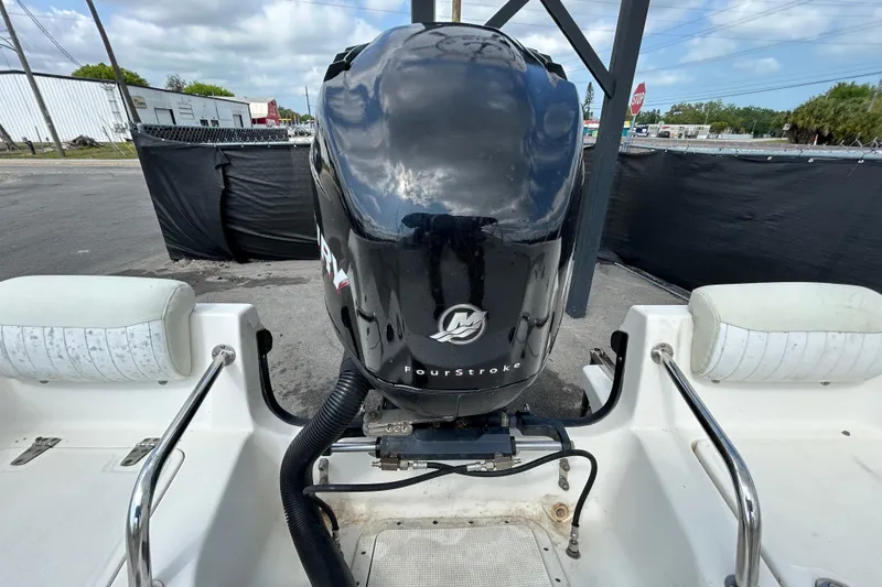 Slide: The Image of 2006 Boston Whaler 205 Conquest boat with a Mercury FourStroke engine. - 40