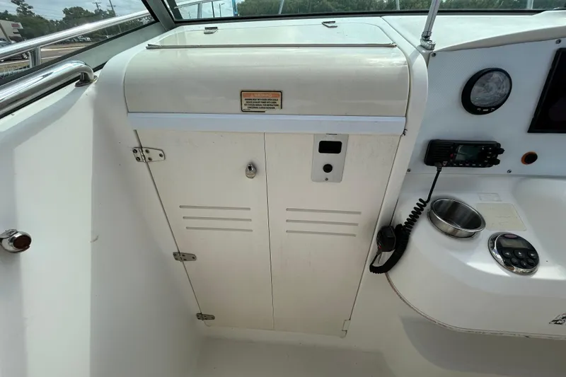 Slide: The Image of Interior view of a 2006 Boston Whaler 205 Conquest boat. - 54
