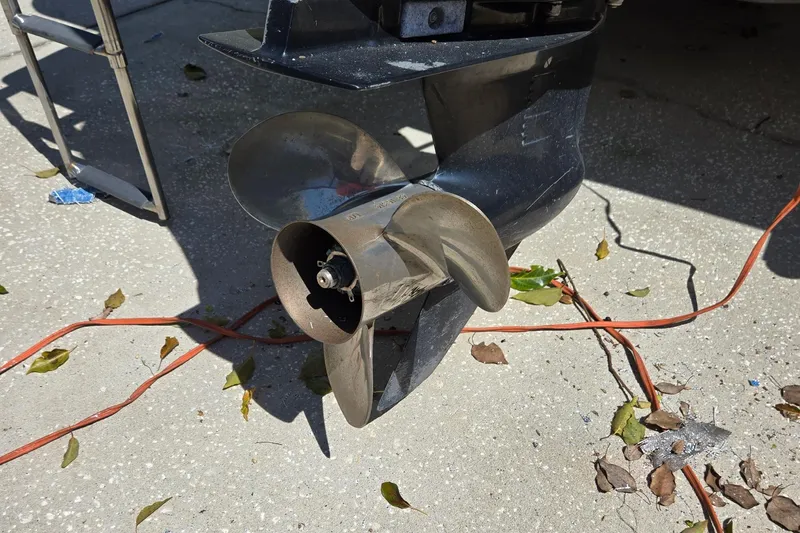 Slide: The Image of Rear view of a 2006 Boston Whaler 205 Conquest boat propeller on a trailer. - 7