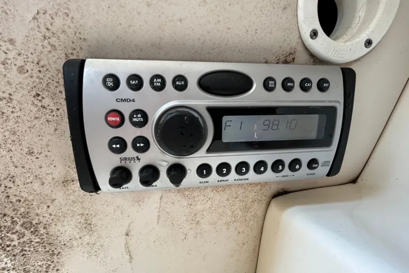 Slide: The Image of Boat stereo system on Boston Whaler 205 Conquest, year 2006. - 70