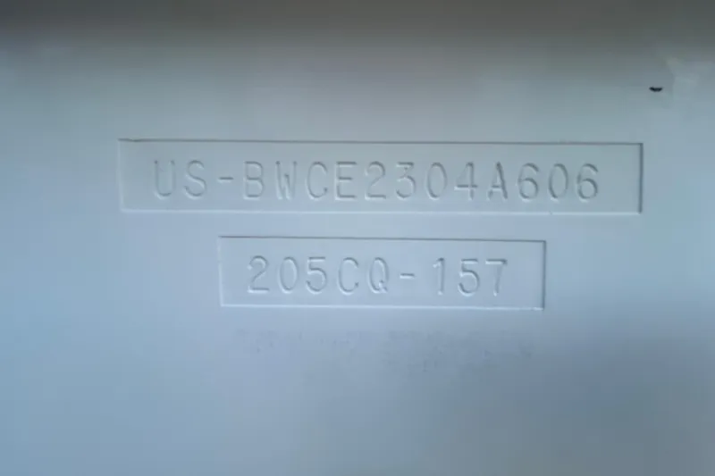 Slide: The Image of Hull identification number on 2006 Boston Whaler 205 Conquest boat. - 76