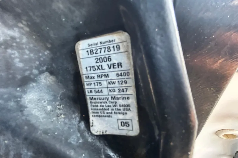 Slide: The Image of Label on 2006 Boston Whaler 205 Conquest, Mercury Marine engine specifications. - 77