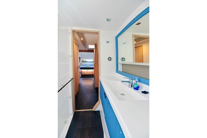 Slide: The Image of Modern bathroom interior of 2024 Fountaine Pajot Astrea 42 yacht, featuring sleek design and spacious layout. - 28