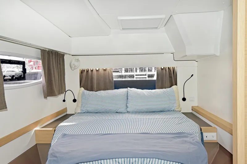 Slide: The Image of Luxurious cabin interior of 2024 Fountaine Pajot Astrea 42 catamaran with cozy bedding. - 34