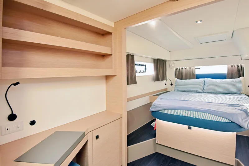 Slide: The Image of Luxurious interior of 2024 Fountaine Pajot Astrea 42 catamaran with cozy bedroom. - 24