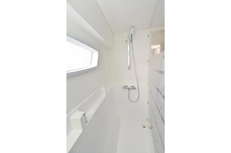 Slide: The Image of Shower area in 2024 Fountaine Pajot Astrea 42 catamaran, featuring sleek modern design. - 27