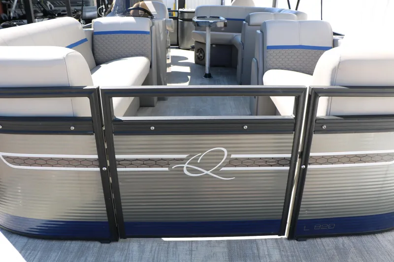 Slide: The Image of 2023 Qwest E820 XRE CR L pontoon boat interior with stylish seating and modern design. - 18