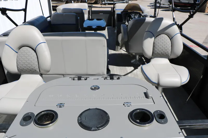 Slide: The Image of Interior of 2023 Qwest E820 XRE CR L pontoon boat with gray seating and fishing station. - 23
