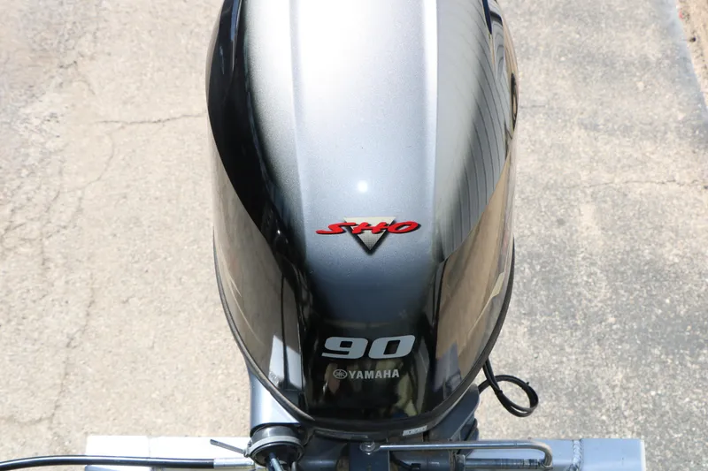 Slide: The Image of Close-up of a Yamaha 90 SHO outboard motor on a Qwest E820 XRE CR L, 2023 model. - 26