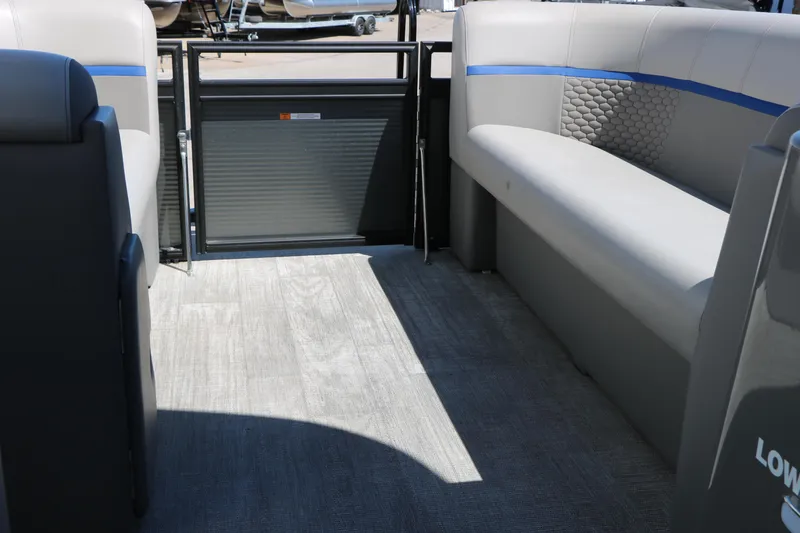 Slide: The Image of Interior of 2023 Qwest E820 XRE CR L pontoon boat with gray seating and flooring. - 29