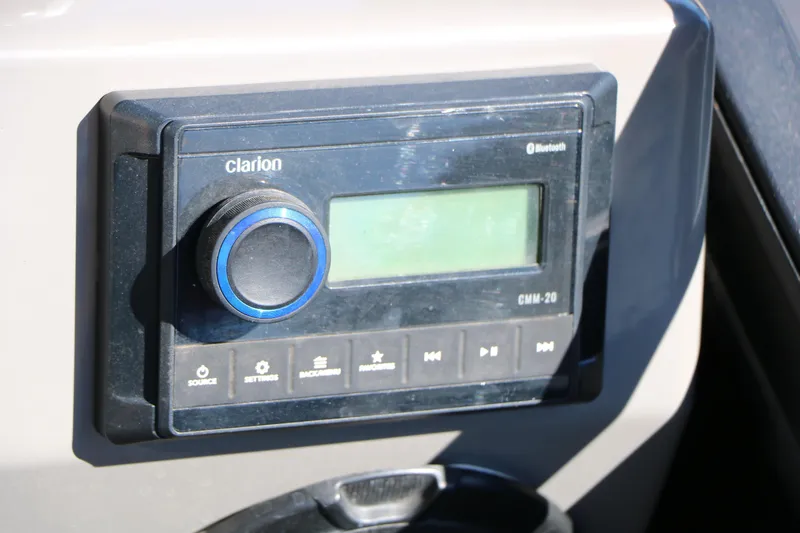 Slide: The Image of 2023 Qwest E820 XRE CR L dashboard with Clarion CMM-20 Bluetooth audio system. - 31