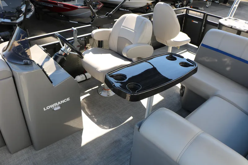 Slide: The Image of Interior of 2023 Qwest E820 XRE CR L pontoon boat with seating and control console. - 32