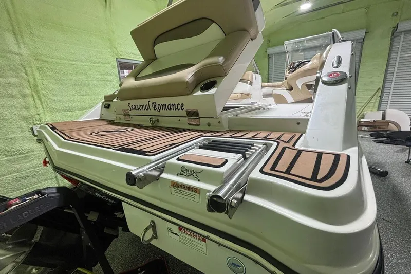 Slide: The Image of 2014 Starcraft Crossover 230 SCX IO boat with "Seasonal Romance" text on deck. - 21