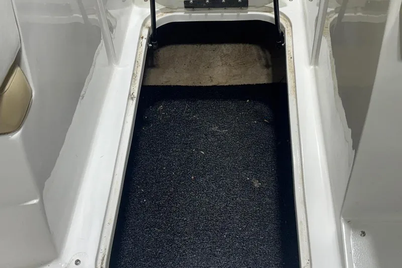 Slide: The Image of Interior view of a 2014 Starcraft Crossover 230 SCX IO boat storage compartment. - 22