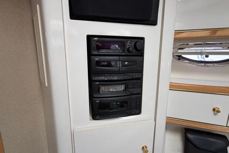 Slide: The Image of JVC audio system in 1996 Maxum 3700 SCR boat interior. - 13