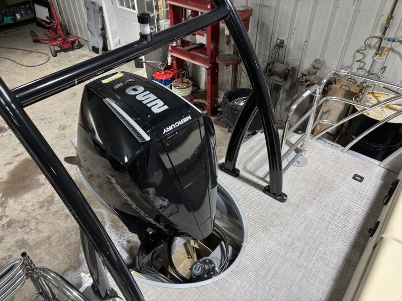 Slide: The Image of 2023 South Bay 500 Series boat with Mercury outboard motor. - 12