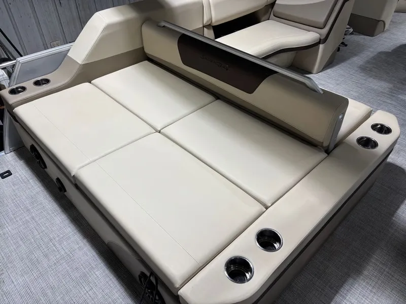Slide: The Image of 2023 South Bay 500 Series 523SB2 3.0 boat seating with cup holders. - 16