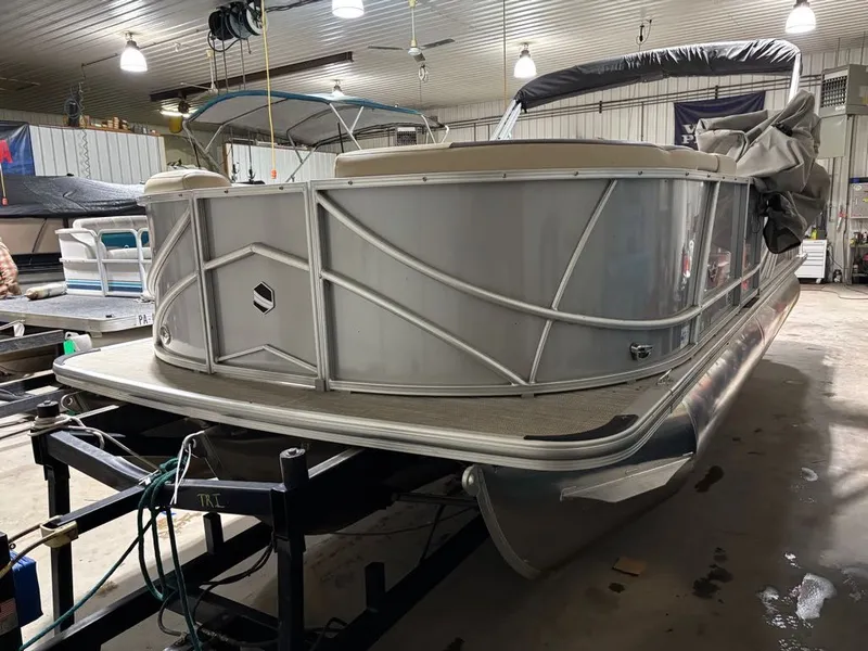 Slide: The Image of 2023 South Bay 500 Series pontoon boat in a workshop. - 3