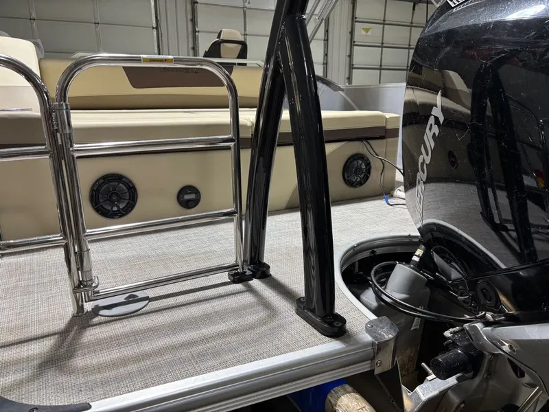 Slide: The Image of 2023 South Bay 500 Series boat with Mercury engine and speakers. - 7