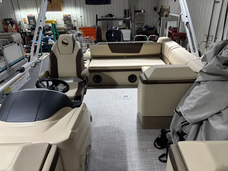 Slide: The Image of Interior of a 2023 South Bay 500 Series pontoon boat in a workshop. - 8