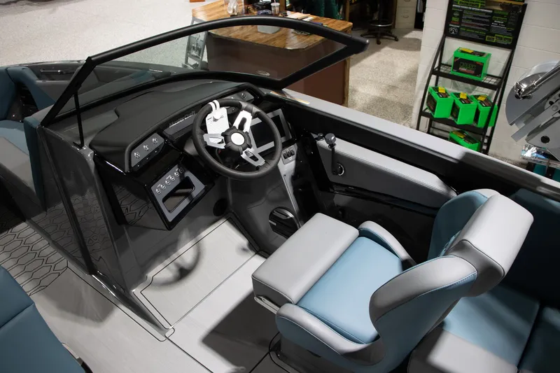 Slide: The Image of Interior of 2026 MasterCraft NXT22 with modern helm station. - 6