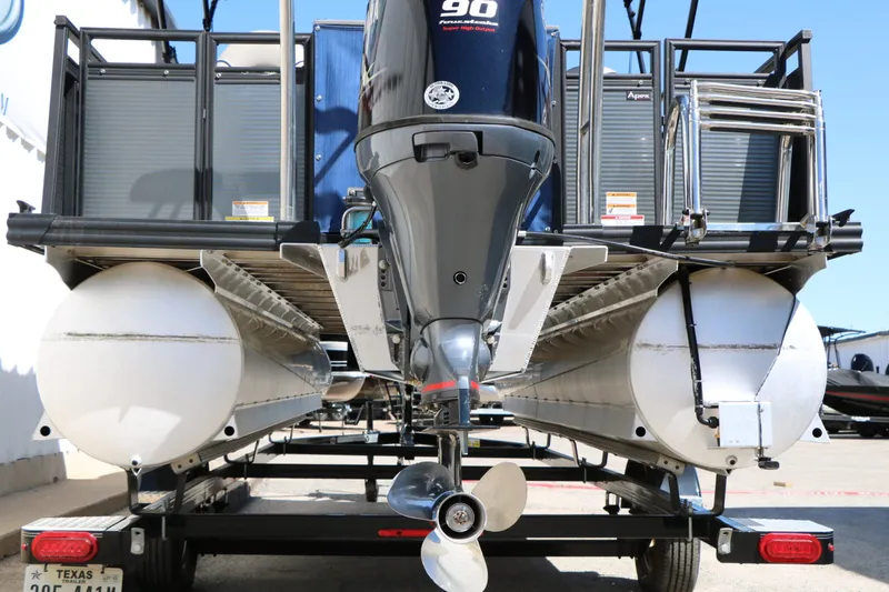 Slide: The Image of Rear view of a 2023 Qwest E820 XRE CR L pontoon boat. - 34