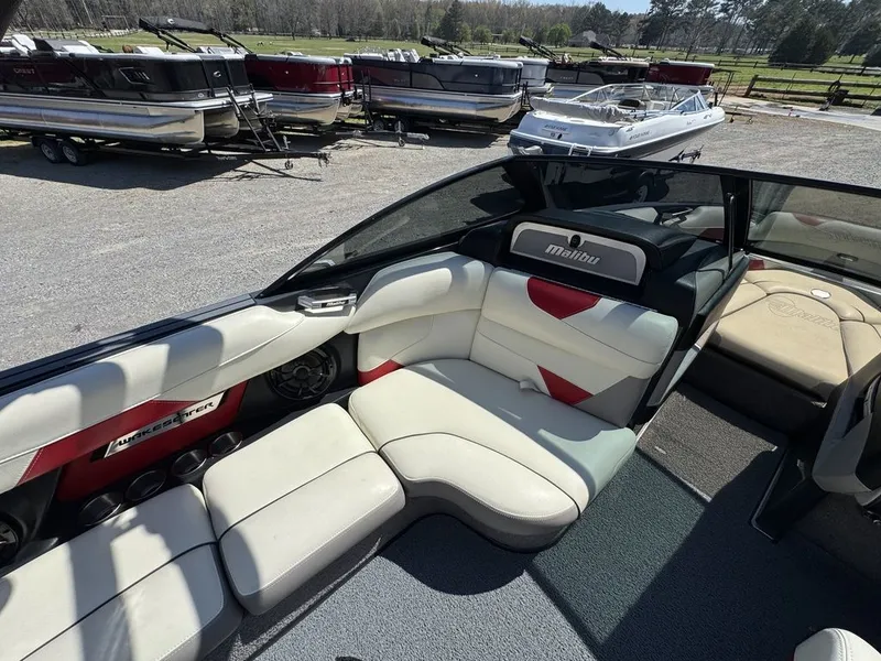 Slide: The Image of Interior of a 2015 Malibu Wakesetter 22 VLX boat with white seating. - 8