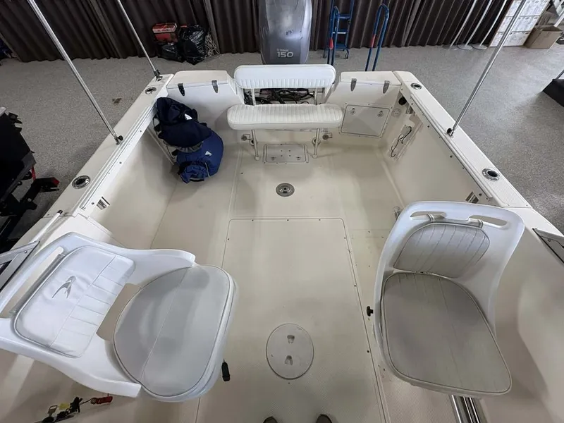 Slide: The Image of Interior of a 2004 Key West 200 DC boat with seating. - 4