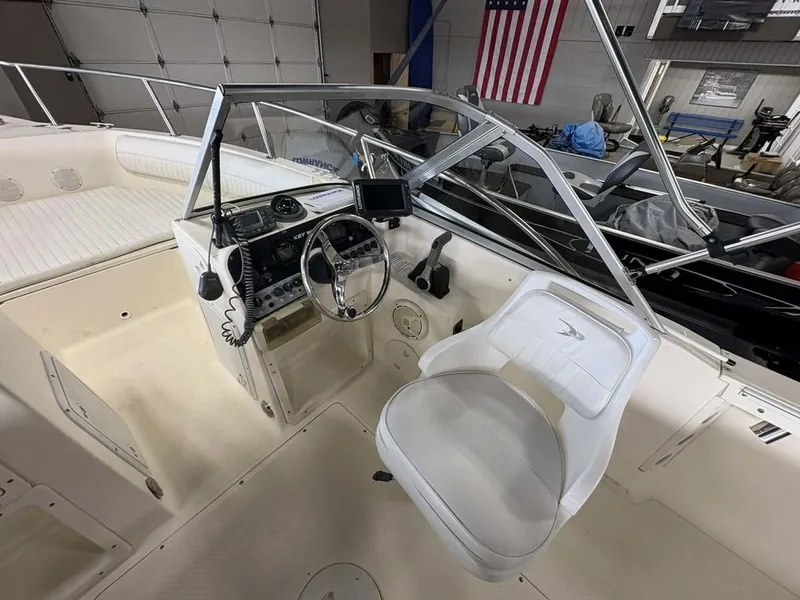 Slide: The Image of Interior of a 2004 Key West 200 DC boat with steering console. - 5