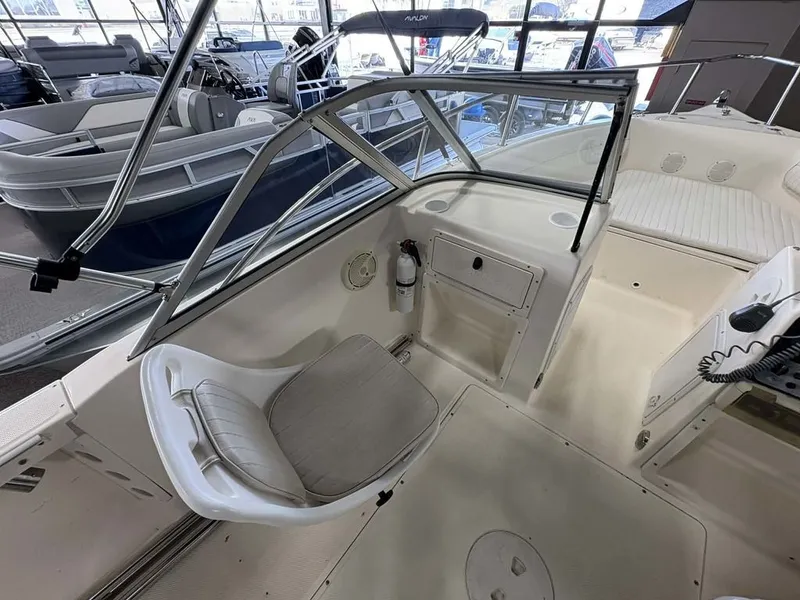 Slide: The Image of Interior view of a 2004 Key West 200 DC boat in showroom. - 6