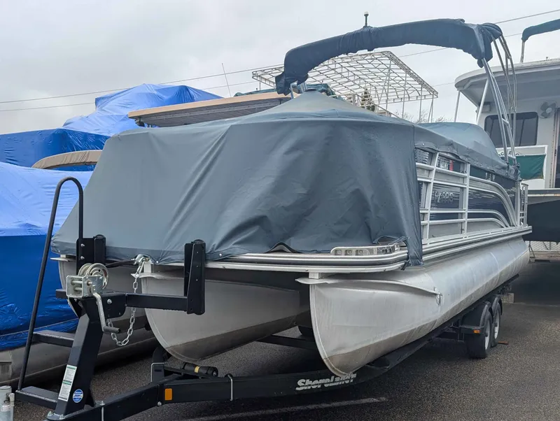 The Image of 2016 Harris Solstice 230 pontoon boat with cover on trailer. - 1