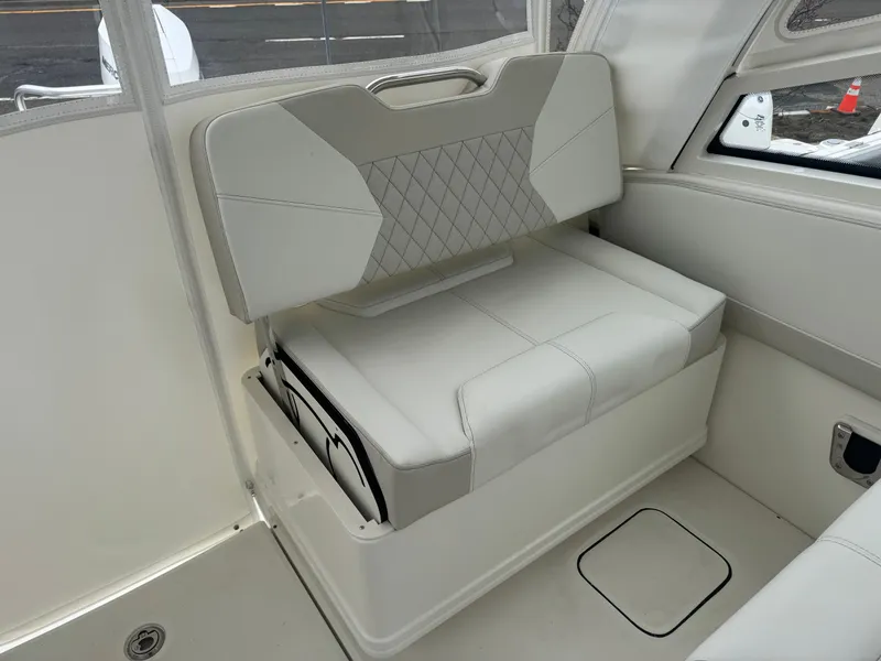 Slide: The Image of Interior of 2026 World Cat 325DC featuring luxurious seat design. - 13