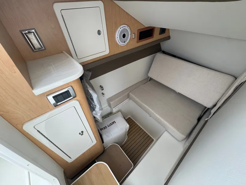 Slide: The Image of Interior of 2026 World Cat 325DC with seating and storage area. - 20