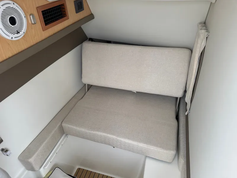 Slide: The Image of Interior of World Cat 325DC 2026 with seating area. - 21