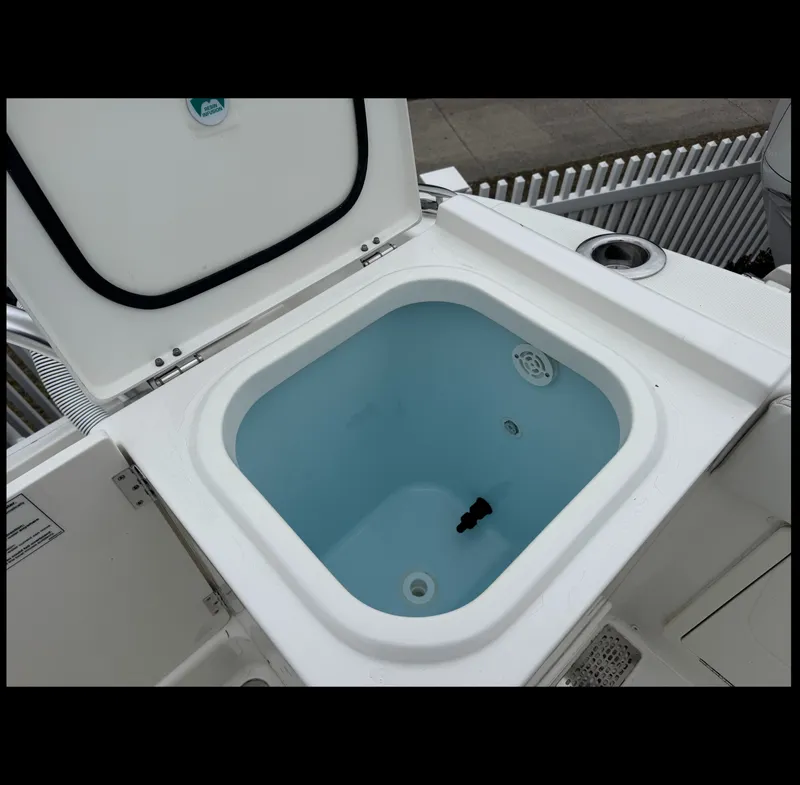 Slide: The Image of Livewell on a 2026 World Cat 325DC boat model. - 26